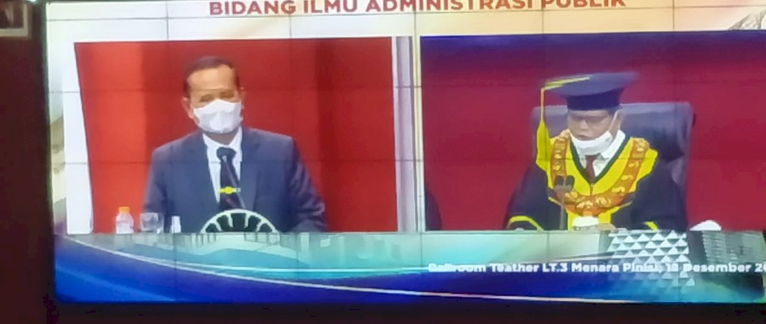 Bupati Luwu, H Basmin Mattayang saat pengukuhan sebagai doktor.