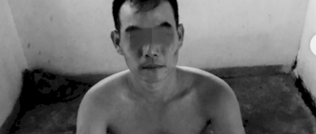 Pelaku saat diamankan polisi.