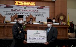 Momen HUT Ke -15 Belopa, Bupati Basmin Terima Dana CSR PT Bank Sulselbar Belopa