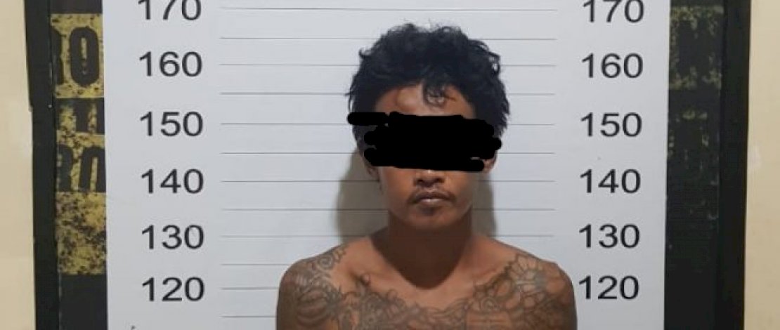 Pelau Fai saat diamankan polisi. FOTO/IST