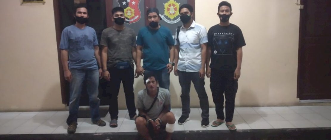 Pelaku pemerkosaan, Alling, saat diamankan Resmob Polres Lutra.