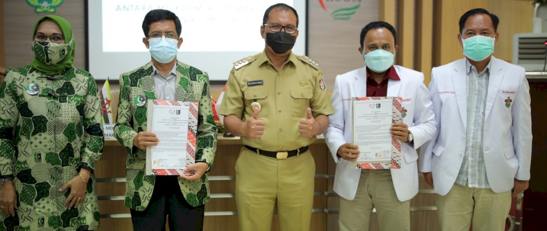 Wali Kota Makassar, Moh Ramdhan Pomanto menyaksikan penandatanganan MoU antara KAHMI Makassar dengan RSGMP Unhas.