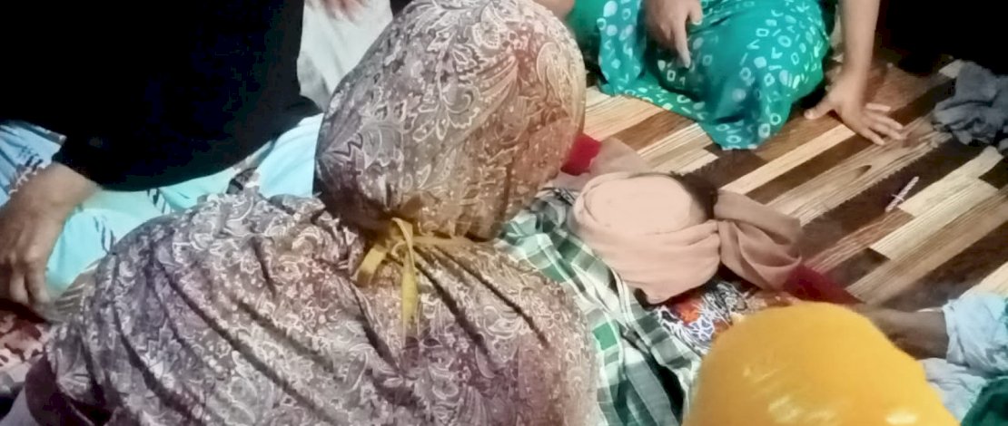 Jasad balita BA saat disemayamkan di rumah duka. 