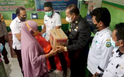 Pasca Banjir Luwu, Bupati Basmin Mattayang Serahkan Bantuan