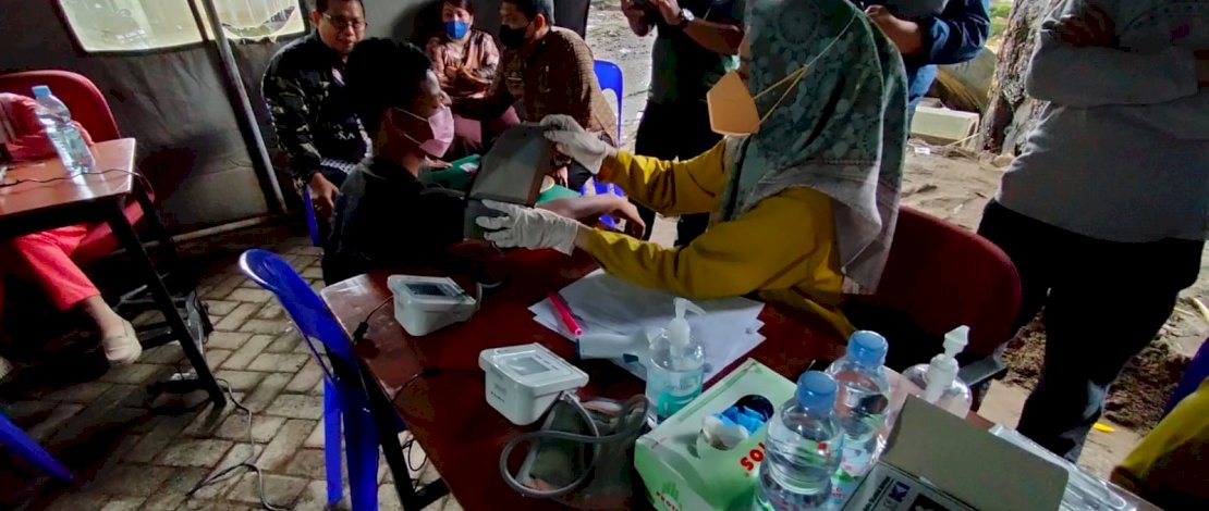 Suasana pelaksanaan vaksinasi massal yang digelar PPM Sulsel, Kamis, 30 Desember 2021.