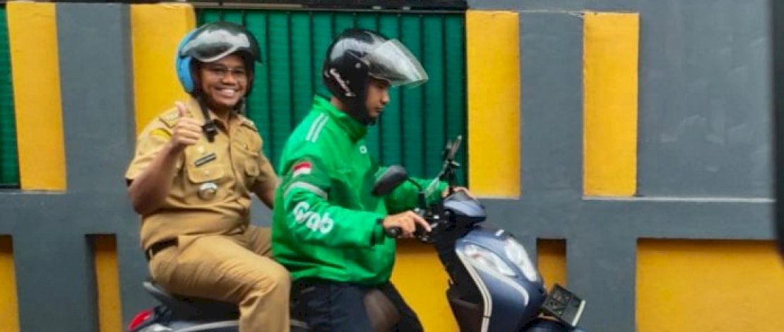 Camat Biringkanaya Gunakan Grab ke Kantor, Sebut Ojol Day Program Langsung Menyentuh Masyarakat