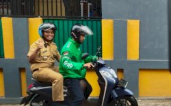 Camat Biringkanaya Gunakan Grab ke Kantor, Sebut Ojol Day Program Langsung Menyentuh Masyarakat