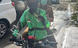 Akhmad Namsum Konsisten Gunakan Transportasi Online di Ojol Day