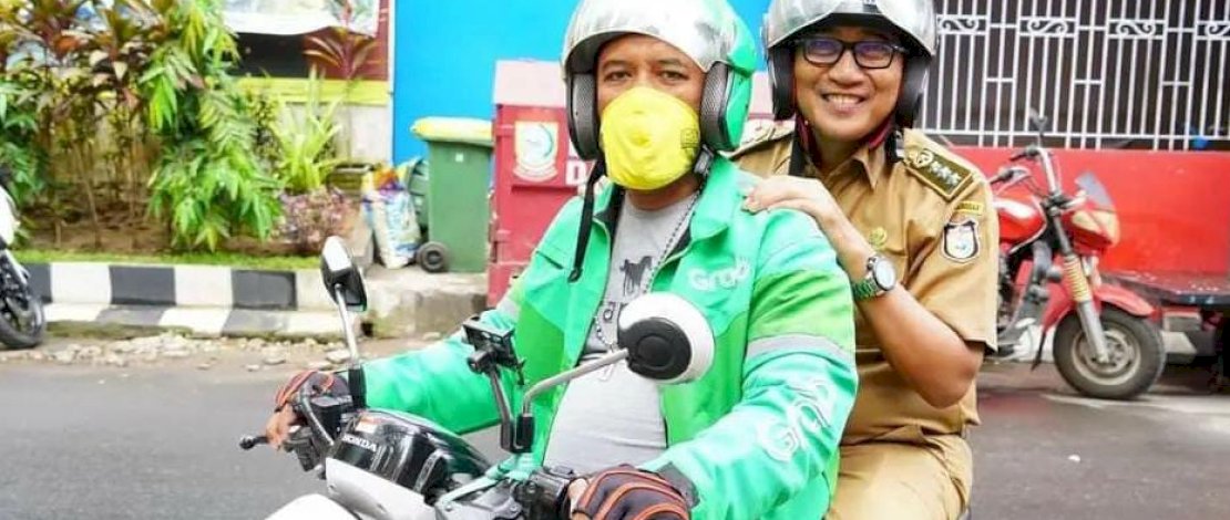 Ojol Day, Camat Makassar Ngantor dan hadiri Acara Naik Ojek Online