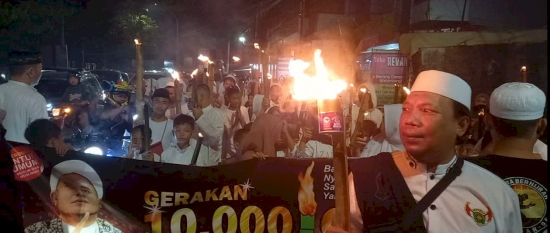 Habibna Makassar menggelar pawai 10.000 obor menyambut bulan suci ramadhan 1444 Hijriah.