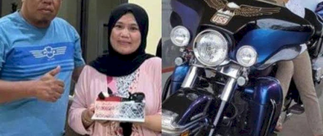 Aiptu Mustahir dan isteri.