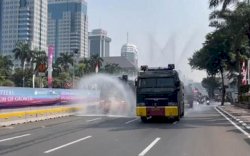 Belajar dari China, Semprot Air ke Jalan Bikin Polusi Menggila
