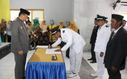 Perpanjang Masa Jabatan, Bupati Basli Ali Harap Kades dan Anggota BPD Tingkatkan Kinerja