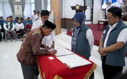 Percepat Penanggulangan Kemiskinan Ekstrem, Pemkab Gowa Kukuhkan Tim LACAK dan Teken Kerja Sama dengan Baznas