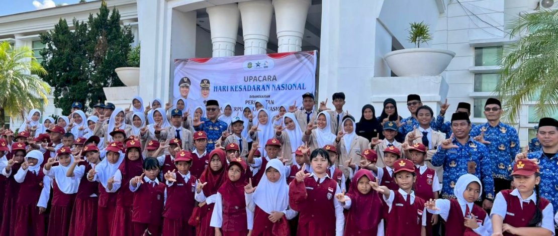 Asisten III Pemerintah Kabupaten Luwu Timur, Drs. Askar, memimpin Upacara Hari Kesadaran Nasional (HKN) yang dirangkaikan dengan peringatan Hari Ulang Tahun ke-46 Perpustakaan Nasional Republik Indonesia serta Hari Kearsipan ke-55 tahun 2026.