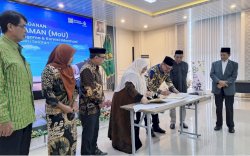 Kemenag - KI Sulsel Teken MoU Perkuat Implementasi Keterbukaan Informasi Publik