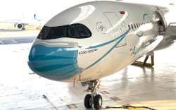 Saat Pesawat Garuda Pakai Masker