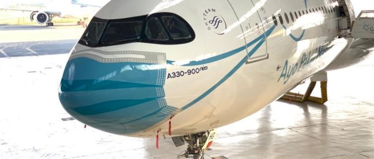 Saat Pesawat Garuda Pakai Masker