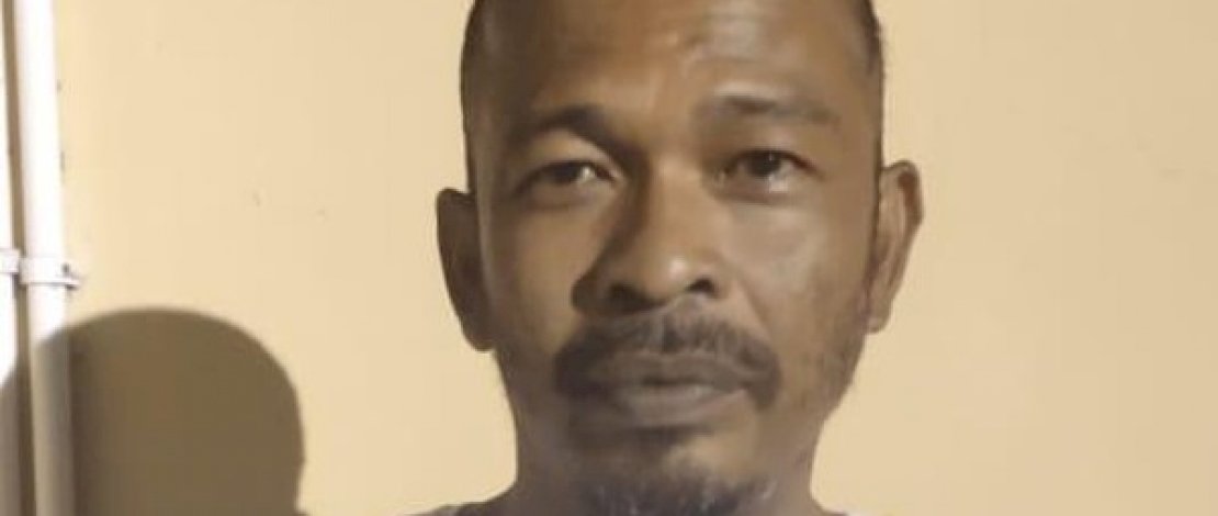 Andi Bunga, pelaku penikaman saat diamankan polisi.