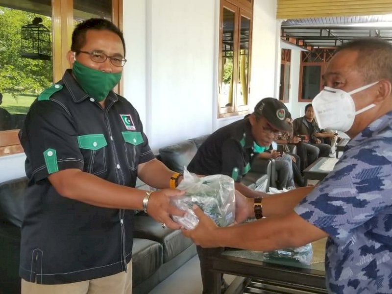  Anggota DPR RI Muhammad Fauzi Bagi Ribuan Masker ke Masyarakat