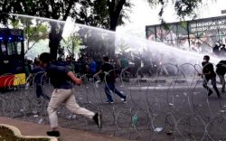 Polisi Amankan Terduga Pelaku Penyerangan terhadap Mobil Polisi dan Jurnalis