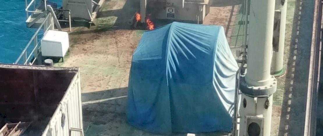 Api tampak berkobar di atas geladak kapal PT Boskalis.
