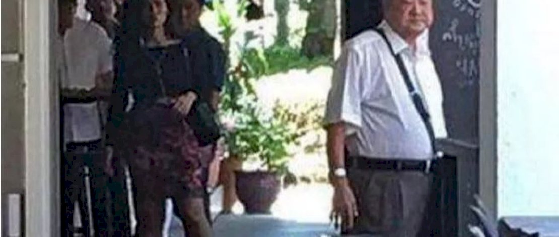 Tan Nam Seng (kanan), usai membunuh menantunya.