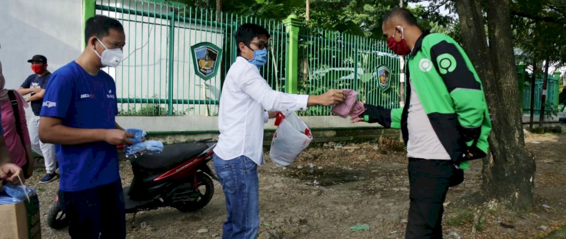 Bareng Komunitas Dokter, Fadli Ananda Bagikan Puluhan Ribu Masker ke Warga